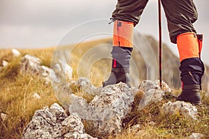 Mountain hiking. Lens flare, shallow depth of field.