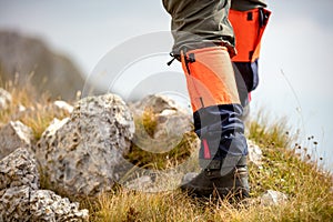 Mountain hiking. Lens flare, shallow depth of field.