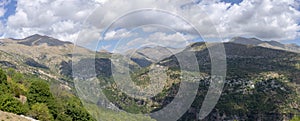 Mountain hills and blue cloudy sky