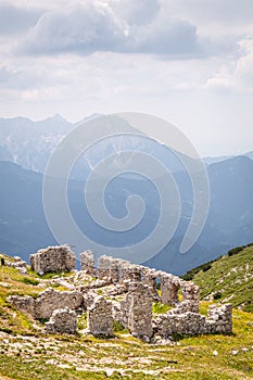 Mountain Hochobir with ruin of hut and Kamnikâ€“Savinja Alps