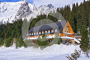 Mountain hotel near Popradske poleso tarn during winter in High Tatras