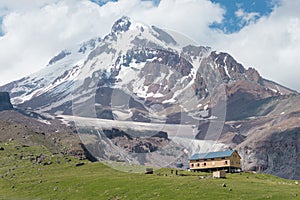 Mountain hut at Mount Kazbek 5047m. a famous landscape in Kazbegi, Mtskheta-Mtianeti, Georgia