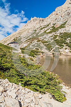 Mountain hut Refugio Frey and Laguna Toncek lake