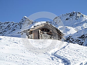 Mountain hut in the snow