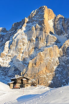 Mountain hut on the snow in the Alps