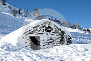 Mountain hut in the snow