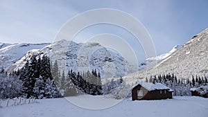 Mountain Hut on Trollstigen road in snow in Norway
