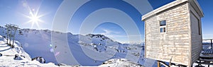 Mountain hut, weather station, ski lift, on Blackcomb Glacier.