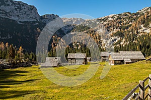 Mountain huts in mountain pasture Laz