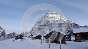 Mountain Huts on Trollstigen road in snow in Norway