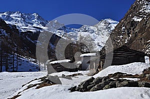 Mountain huts under snow, Italian Alps, Aosta Valley.