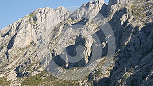 Mountain Komovi in Montenegro. Fog is falling on mountain as sun goes down