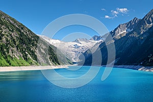 Mountain lake in Austria. High mountains region at the day time. Natural landscape in Austria mountains.