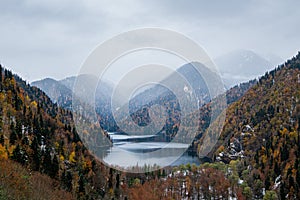 mountain lake autumn-winter time period. cloudy weather overcast. landscape