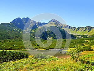 Mountain lake Biele pleso in National Park High Tatra.