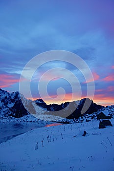 Mountain lake called Litvorove pleso in High Tatras mountains during winter sunset, Slovakia