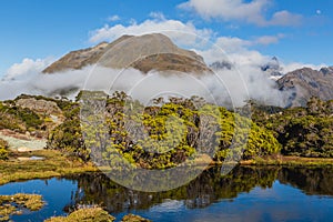 Mountain lake and clouds , Key Summit Trail, Routeburn Track, New Zealand