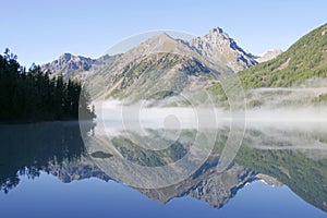 Mountain lake and fog