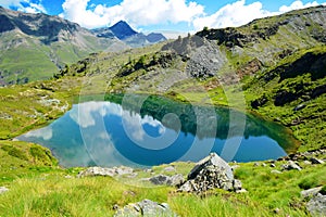 Mountain lake Lago di Loie in National park Gran Paradiso, Lillaz, Cogne, Aosta valley, Italy.