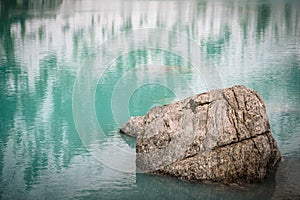Sorapis lake in dolomiti, italy. photo