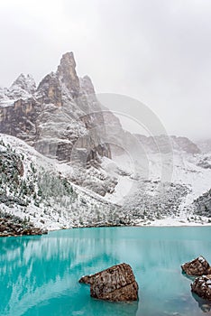 Sorapis lake in dolomiti mountains, italy. in winter photo