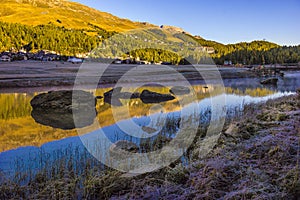 Mountain lake panorama with mountains reflection. Idyllic look. Autumn forest. Silvaplana Lake,