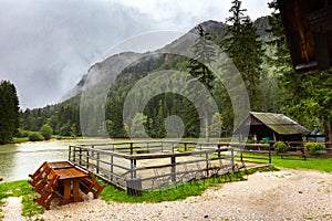 Mountain lake rainy weather view