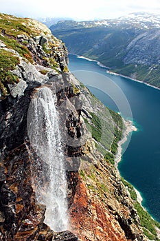 Mountain lake and small waterfall, Norway.