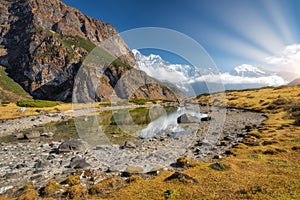 Mountain and lake at sunrise in Nepal. Beautiful landscape