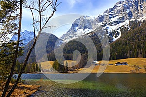 Mountain lake in thae Bavarian Alps in spring and snow on the mountains.