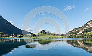 The mountain lake Thiersee in Tyrol, Austria photo