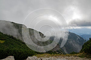 Mountain landcape with cloud and fog