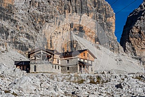 Mountain landscape and alpine hut Angelo Alimonta in Dolomites Alps