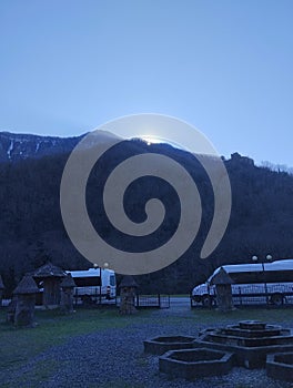 Mountain landscape with an apiary in Abkhazia. Sunrise