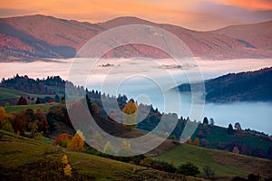 Mountain landscape in autumn at sunrise