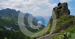 Mountain landscape, beach and town in north Tenerife. Sunny day, spectacular view on ocean, Anaga hills and cute village