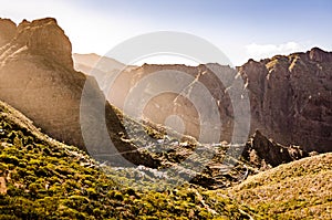 Mountain landscape with cliffs and village and terrace gardens. Famous old town of Masca on Tenerife, Canary Islands