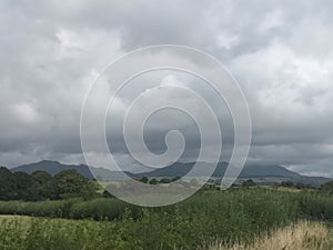 Mountain landscape in clouds and rain