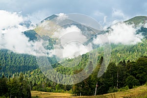 Mountain landscape with cloudy sky, krasnaya polyana, sochi, russia