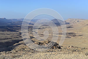 Mountain landscape, desert. Makhtesh Ramon Crater in Negev desert, Israel. Stony desert panoramic view. Unique relief