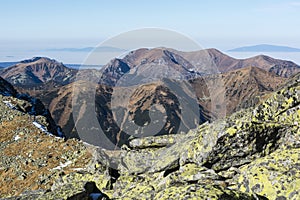 Mountain landscape with domed peaks. Tatra Mountains, Slovakia.The road through the green mountain valley