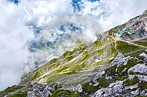 Mountain landscape with forest and blue sky in Austrian Alps. Tirol region