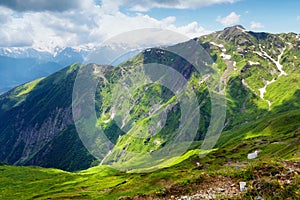 Mountain landscape with green grass