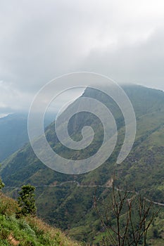 Mountain landscape, green slopes. Beauty of mountains. Little Adam peak, mountain in the fog view from the jungle