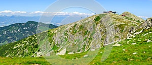 Mountain landscape on a hiking trail in the Low Tatras, Slovakia. View of mountain peaks and valleys while hiking along a mountain