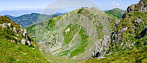 Mountain landscape on a hiking trail in the Low Tatras, Slovakia. View of mountain peaks and valleys while hiking along a mountain