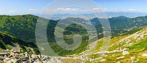 Mountain landscape on a hiking trail in the Low Tatras, Slovakia. View of mountain peaks and valleys while hiking along a mountain