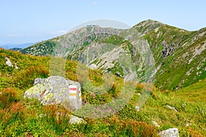 Mountain landscape on a hiking trail in the Low Tatras, Slovakia. View of mountain peaks and valleys while hiking along a mountain