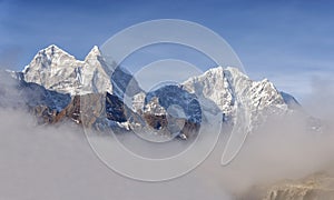 Mountain landscape of the Himalayas. Peak Kangtega and Thamserku. Eastern Nepal photo