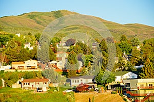 Mountain Landscape of house and tree in city Pocatello in the state of Idaho